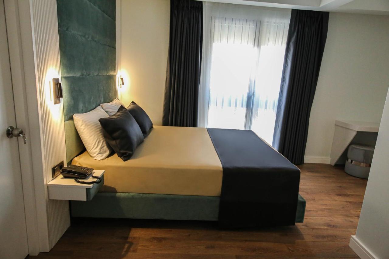 Axu Airport Hotel Arnavutkoy Eksteriør bilde A bedroom at the hotel